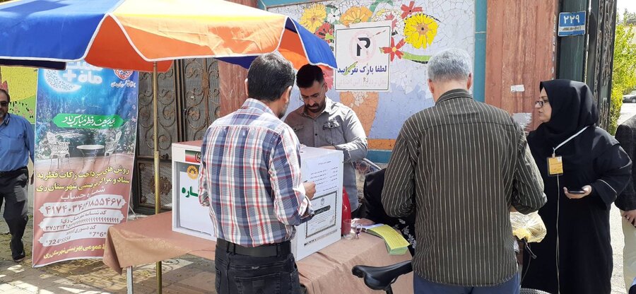 شهرری | استقبال مردم از پایگاه های جمع آوری زکات فطریه